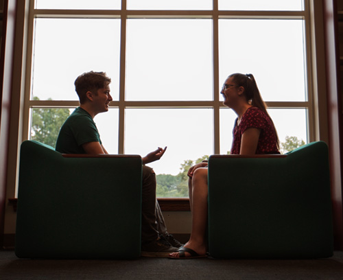 two students talking