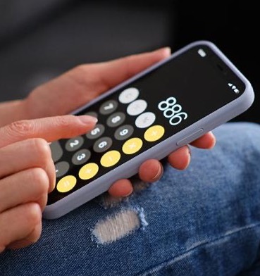 A person using a calculator app