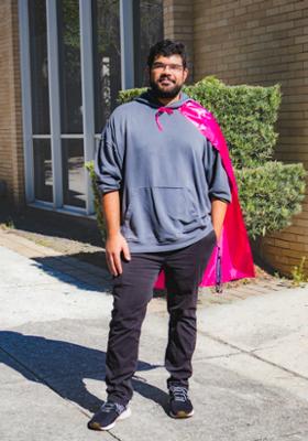 Photo of James Spivey with hero cape