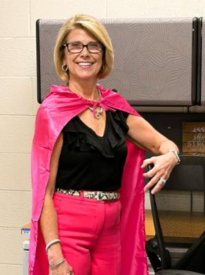Photo of Lori Fischer with hero cape