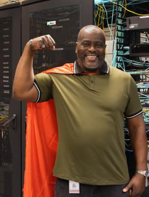 Photo of Norman Ricks with hero cape