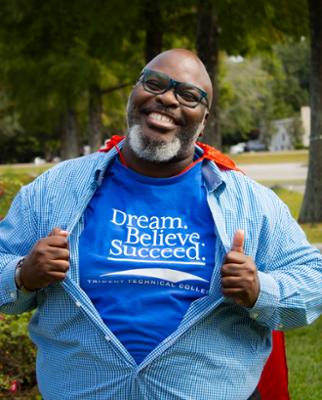 Photo of Ronald Johnson with hero cape