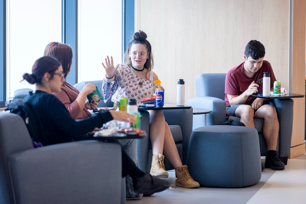 Group of students at a table in Berkeley Campus commons area