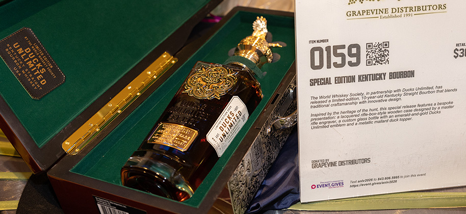 A bottle of bourbon in a presentation case.