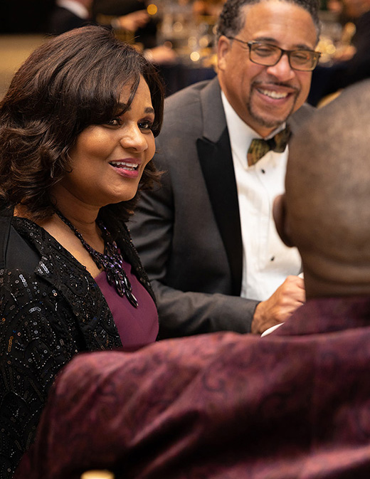 Guests seated together at a table during the 2026 event.