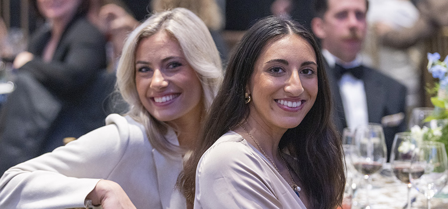 Guests seated at a dinner table during the 2026 event.