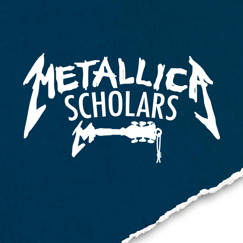 A blue square of paper with the bottom edge torn. On the paper is the logo for Metallica Scholars