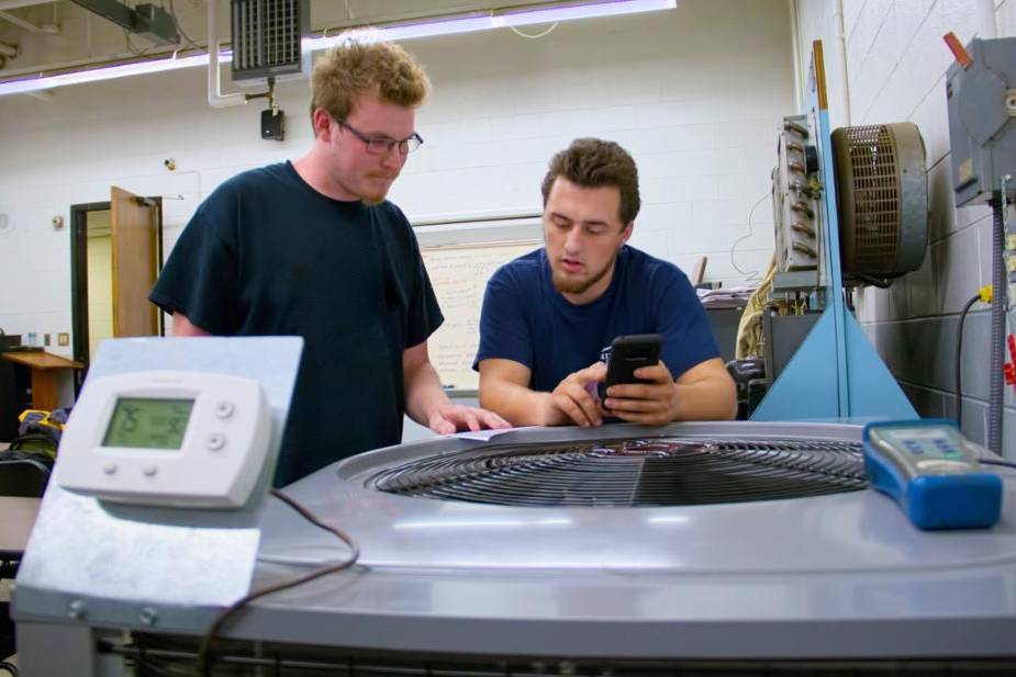 Air Conditioning and Refrigeration sutdents learn to work on HVAC units