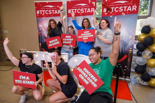 Students with TTC president at welcome event