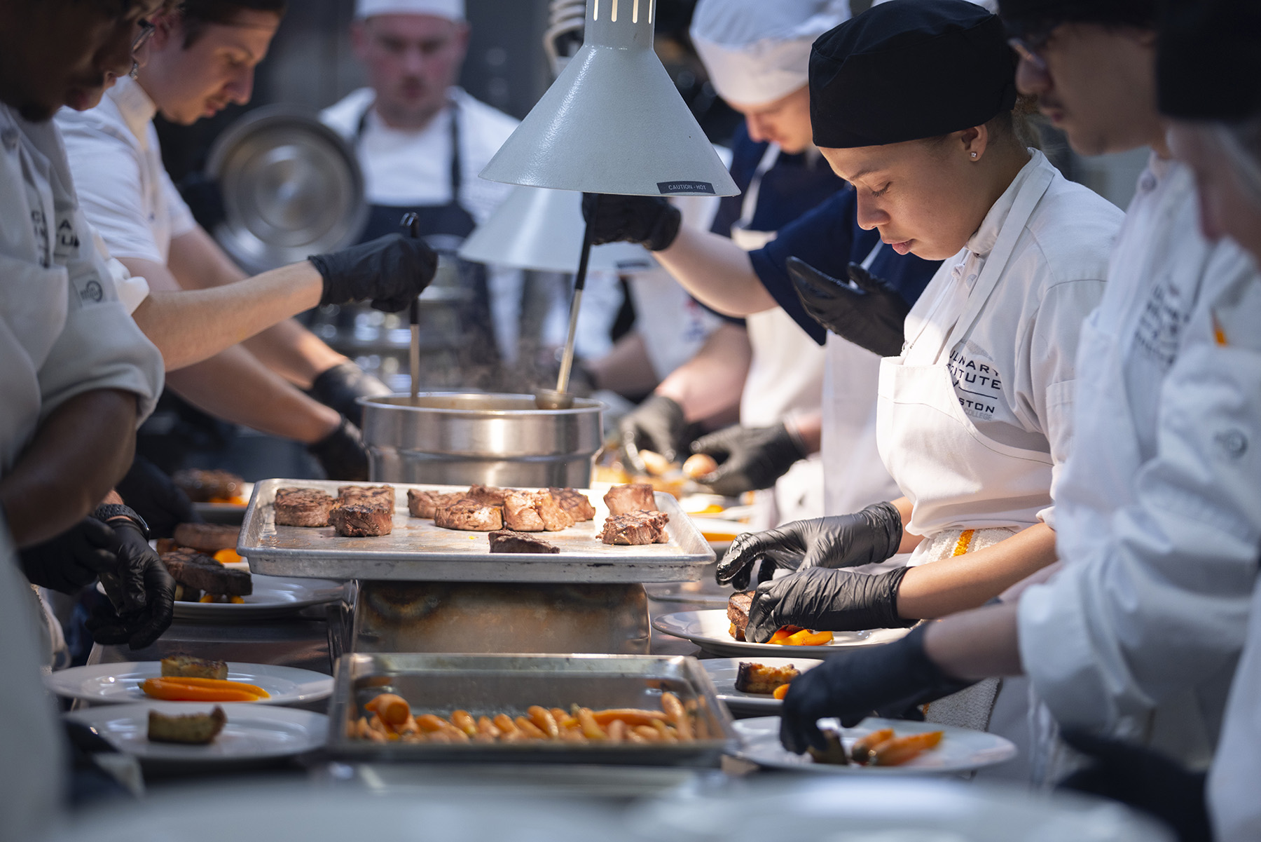 Culinary Institute of Charleston students prepare and serve the four-course meal for A Night in the Valley.