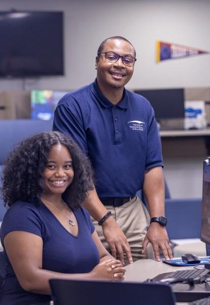 Derrick Winn with Student