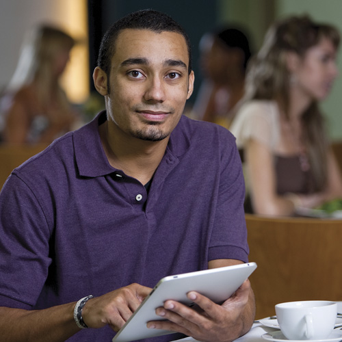 A student with a learning device.