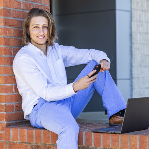 A student with a learning device.